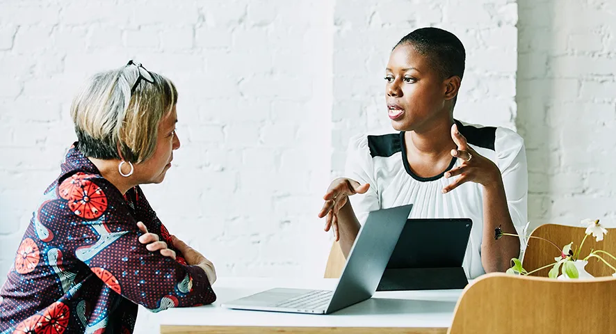 Two women having a work meeting together