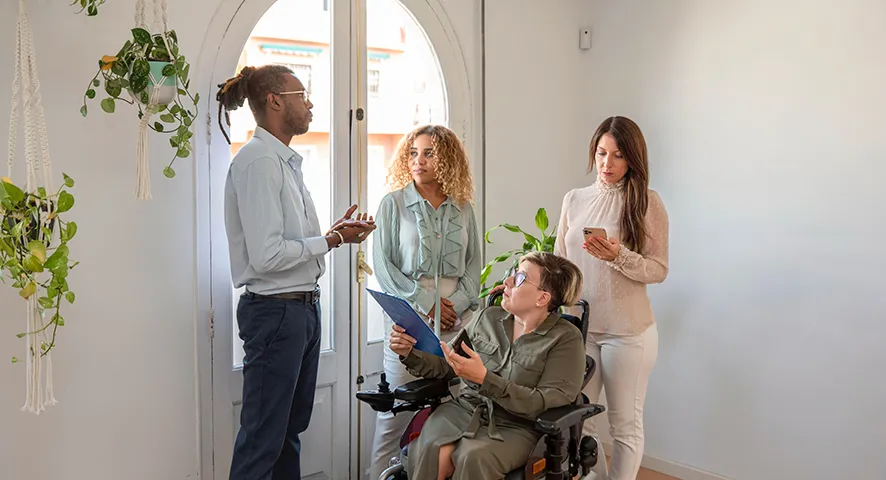 Disabled woman with her family and financial advisor
