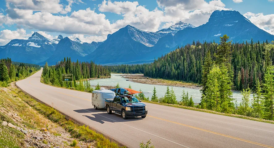 Truck driving through scenic road